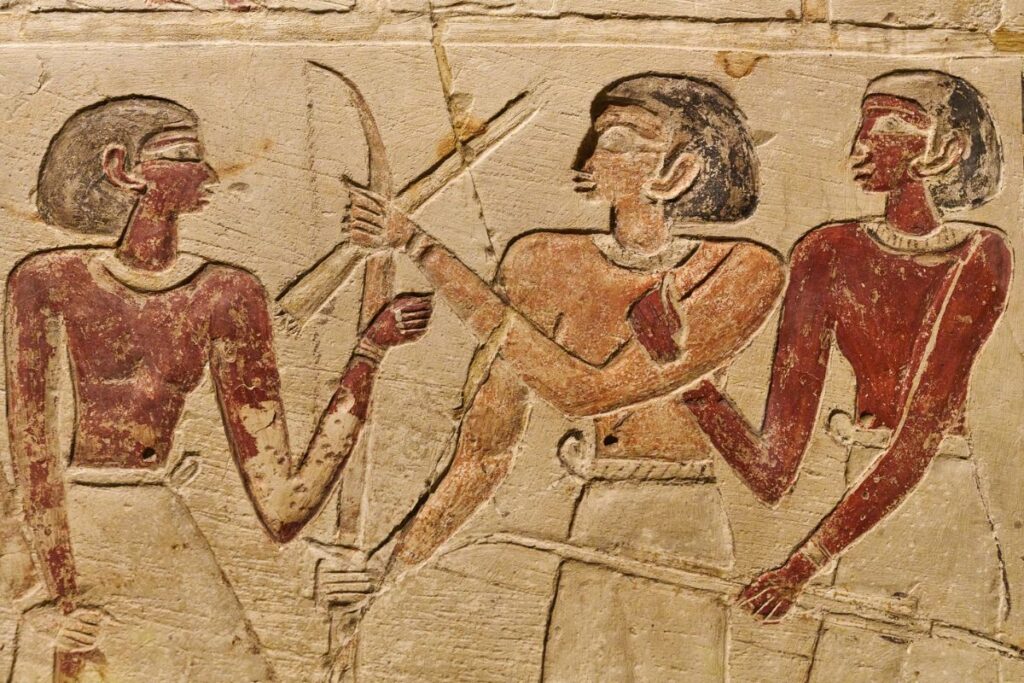 Warriors on old egyptian Hieroglyphic carvings.